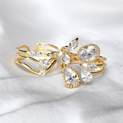 Gold Plated CZ Water Drops Open Ring - Waterproof. Indulge in the luxurious beauty! With its waterproof design, this ring will be a stunning addition to your jewellery collection. The sparkling CZ water drops add a touch of glamour to any outfit.